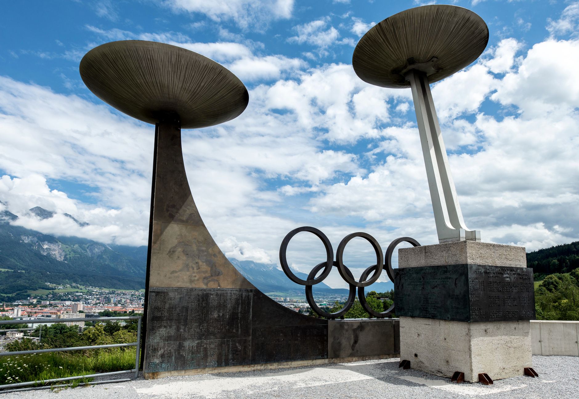 Olympic monument in Innsbruck with scenic alpine background, perfect for travel images.