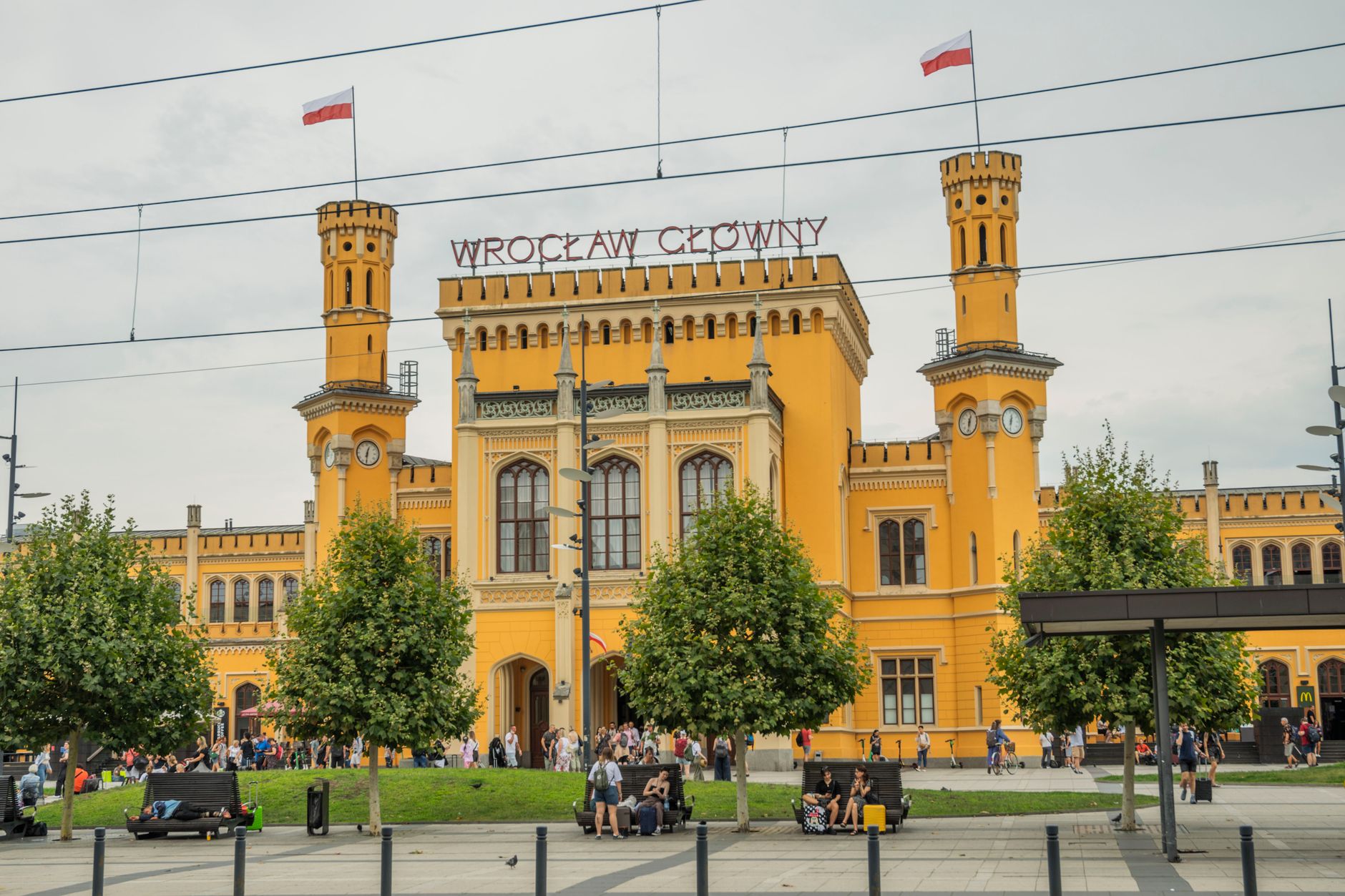 Vibrant facade of Wrocław Główny train station, a key landmark in Wrocław, Poland.